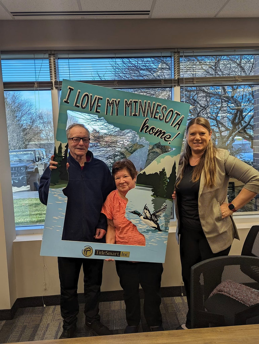 Candice with clients on closing day