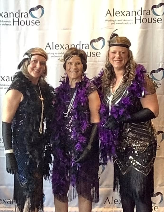 Candice with friends at an Alexandra House gala