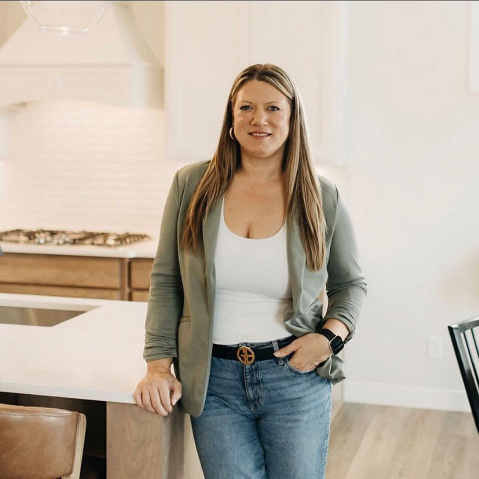 Candice in a renovated kitchen