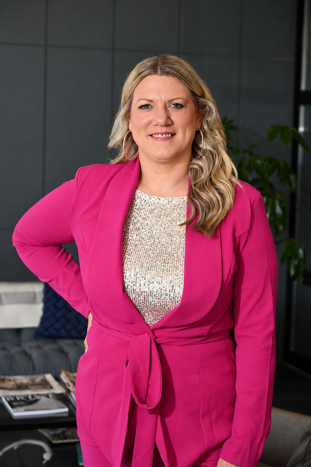 Candice Amundson in a pink suit
